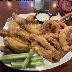 Locos Grill & Pub - Lemon Yaki wings with onion rings and a handful of celery.  It was good!!