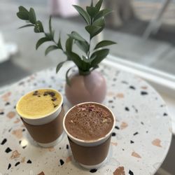 Elixxr Cafe - Tumeric and Cacao lattes