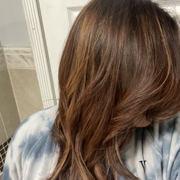 This is in normal lighting. Redish/brown and blonde highlights