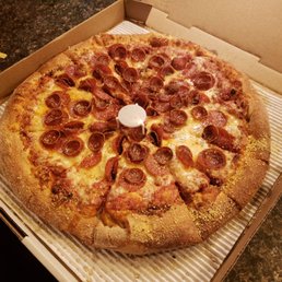 a pepperoni pizza in a box