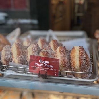 SuzyQ Doughnuts Hintonburg - sugared doughnuts in a display case - Donuts Near Me - Ottawa, Ontario