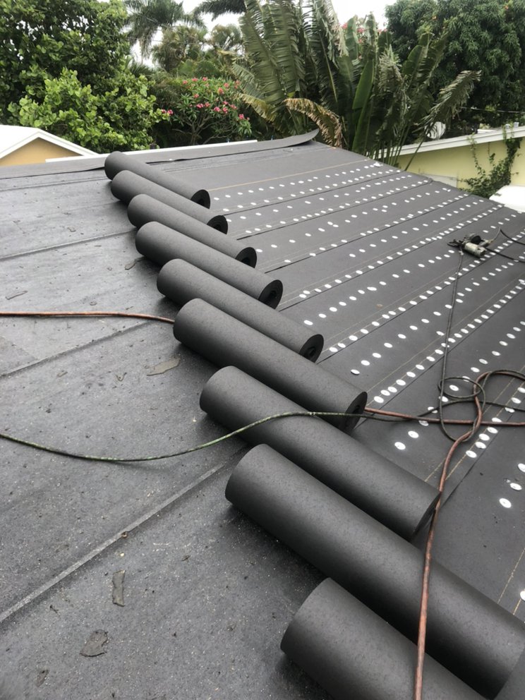 Slide of Best American Roofing