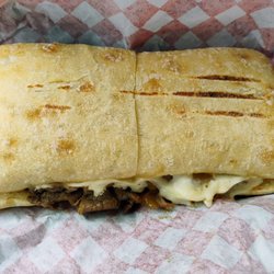 Coffee 'n Crust - Steak and cheese sandwich $12.99.
