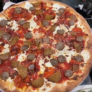 The District - All meat pizza - American Near Me - Providence, Rhode Island The District - All meat pizza - American Near Me - Providence, Rhode Island