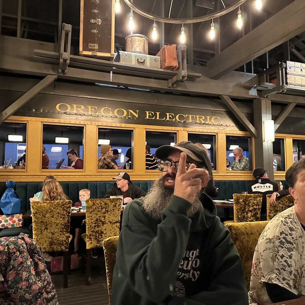 The Old Spaghetti Factory - a man and woman sitting at a table - Italian Near Me - Eugene, Oregon The Old Spaghetti Factory - a man and woman sitting at a table - Italian Near Me - Eugene, Oregon