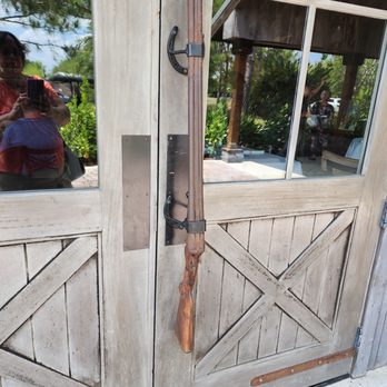 OK Corral Gun Club - Gun handle on door - Venues & Event Spaces Near Me - Okeechobee, Florida OK Corral Gun Club - Gun handle on door - Venues & Event Spaces Near Me - Okeechobee, Florida