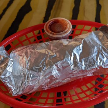 La Perlita - a burrito wrapped in aluminum foil with a side of ketchup - Mexican Near Me - San Diego, California La Perlita - a burrito wrapped in aluminum foil with a side of ketchup - Mexican Near Me - San Diego, California
