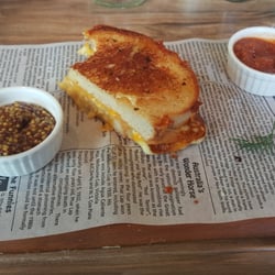 Half eaten ultimate cheese toastie