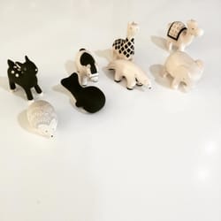 Studio Den - Hand-carved and hand-painted.