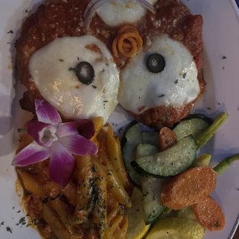 Pizza and More - Chicken Parmigiana with a beautiful happy face, penne and vegetables - Pizza Near Me - Vista, California Pizza and More - Chicken Parmigiana with a beautiful happy face, penne and vegetables - Pizza Near Me - Vista, California