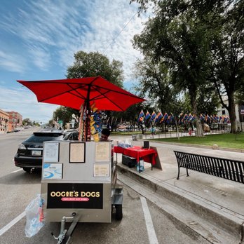 Oogies Dogs - a food cart with a red umbrella - Food Trucks Near Me - Prescott, Arizona Oogies Dogs - a food cart with a red umbrella - Food Trucks Near Me - Prescott, Arizona