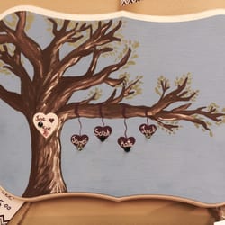 Lizzie's Corner Consignment and Gifts - Customized Family Tree Plaques created by a local artist.