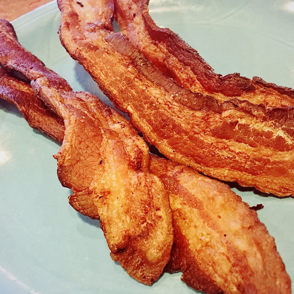 Biscuits Cafe - Side of bacon. 4 large pieces come Very Crispy! Delicious but if you don't like it Crispy make sure to request it under. - Breakfast & Brunch Near Me - Glendale, Arizona Biscuits Cafe - Side of bacon. 4 large pieces come Very Crispy! Delicious but if you don't like it Crispy make sure to request it under. - Breakfast & Brunch Near Me - Glendale, Arizona