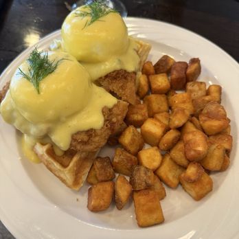 Cafe Volare - Nashville chicken eggs benny (ordered not spicy) with fried potatoes - Breakfast & Brunch Near Me - Enid, Oklahoma