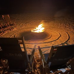 Light Me Up Beach Bonfires - Set up was perfect. The attendant was excellent, kept the fire stoked, yet gave us privacy. He took care of our every need!