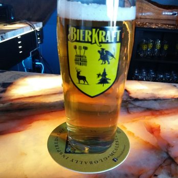 BierKraft - a glass of beer on a table - Breweries Near Me - McAlester, Oklahoma