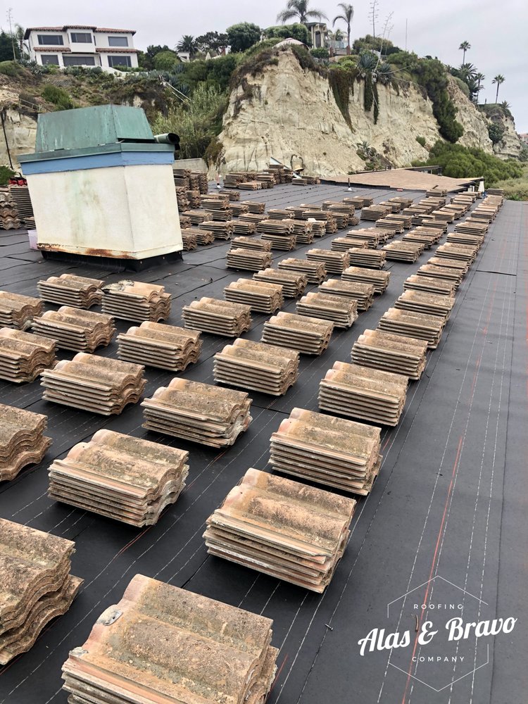 Slide of Alas & Bravo Roofing Company