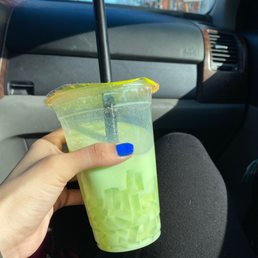 Honeydew milk tea with lychee jellies. Honeydew milk tea with lychee jellies.