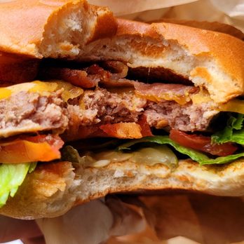 Burgerville - Inside the bacon cheeseburger. I pulled off the heap of red onions. - Burgers Near Me - Aloha, Oregon Burgerville - Inside the bacon cheeseburger. I pulled off the heap of red onions. - Burgers Near Me - Aloha, Oregon