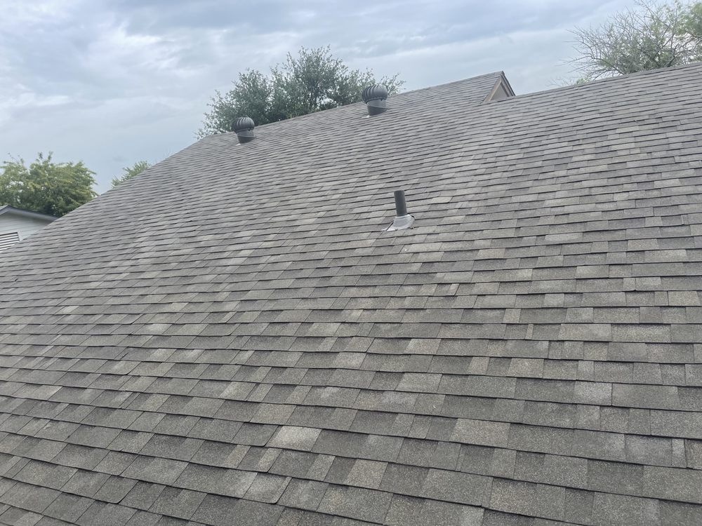 Slide of DE AL Roofing