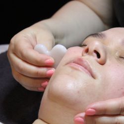 Elements Massage - Enhance your facial with a Gua Sha Stone Massage! Lift, sculpt, and rejuvenate for glowing, radiant skin.