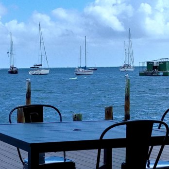 Nate's Boathouse - A partial view of Christiansted Harbor, the Caribbean Sea, and various boats. - Seafood Near Me - Christiansted, Virgin Islands Nate's Boathouse - A partial view of Christiansted Harbor, the Caribbean Sea, and various boats. - Seafood Near Me - Christiansted, Virgin Islands