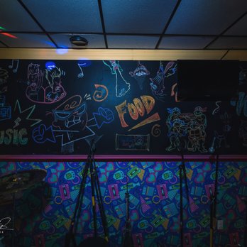 Nostalgia - neon lights and graffiti on a blackboard wall - Bars Near Me - Bethpage, New York Nostalgia - neon lights and graffiti on a blackboard wall - Bars Near Me - Bethpage, New York