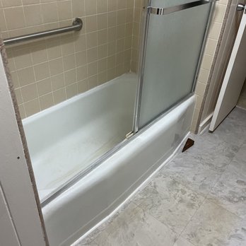 Island Bath Works - a view of a bathtub and shower - General Contractors Near Me Island Bath Works - a view of a bathtub and shower - General Contractors Near Me