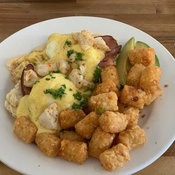 Redhead Bay Cafe - Crab Benedict and tater tots with a side of avocado added - New American Near Me - Virginia Beach, Virginia Redhead Bay Cafe - Crab Benedict and tater tots with a side of avocado added - New American Near Me - Virginia Beach, Virginia