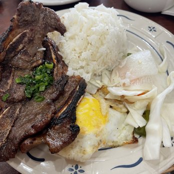 Little Saigon - #12 Korean beef style with fried egg and rice. FREAKING BOMB. The beef ribs were soooo good - Vietnamese Near Me - Madison Heights, Michigan Little Saigon - #12 Korean beef style with fried egg and rice. FREAKING BOMB. The beef ribs were soooo good - Vietnamese Near Me - Madison Heights, Michigan