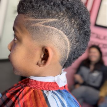 Kutthroat Studios - Burst fade with design - Barbers Near Me - Huntington Beach, California Kutthroat Studios - Burst fade with design - Barbers Near Me - Huntington Beach, California