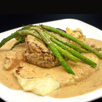 Maderas Steak & Ribs - 8oz Prime Scotts Peppercorn Filet on a bed of garlic mashed potatoes, topped with asparagus & our famous peppercorn sauce - Barbeque Near Me - Los Alamitos, California Maderas Steak & Ribs - 8oz Prime Scotts Peppercorn Filet on a bed of garlic mashed potatoes, topped with asparagus & our famous peppercorn sauce - Barbeque Near Me - Los Alamitos, California