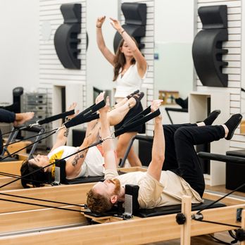 Logan Square Pilates Core - One of our instructors leading a group Pilates class - Pilates Near Me - Chicago, Illinois Logan Square Pilates Core - One of our instructors leading a group Pilates class - Pilates Near Me - Chicago, Illinois