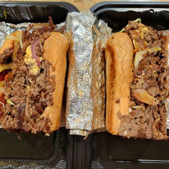 Just Sub & Wing - The ribeye steak and cheese sub with lettuce, tomatoes, and grilled onions. - Sandwiches Near Me - Camp Springs, Maryland Just Sub & Wing - The ribeye steak and cheese sub with lettuce, tomatoes, and grilled onions. - Sandwiches Near Me - Camp Springs, Maryland