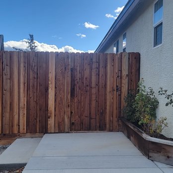 Fence it - a wooden fence in front of a house - Fences & Gates Near Me Fence it - a wooden fence in front of a house - Fences & Gates Near Me