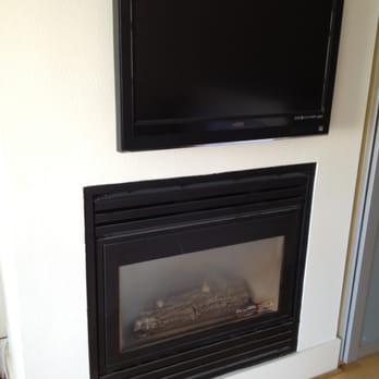 Custom Plasma Install - Mounted above fireplace - Home Theatre Installation Near Me - Orlando, Florida