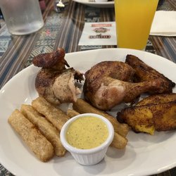 Mi Perú Peruvian Cuisine - Peruvian chicken with fried yuca and fried plantain