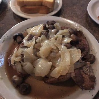 Capers - T-Bone Steak with mushroom and onion.  Swimming in juices and had to send it back - Steakhouses Near Me - Detroit, Michigan