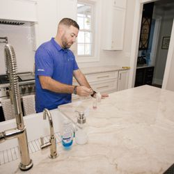 Quality Life Solutions - A water specialist doing a FREE in-home water analysis