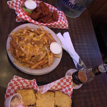 Saddle Sore Eatery & Saloon - Jalapeño sweet corn bread, Cajun cheese fries and buffalo wings. - Steakhouses Near Me - Norco, California Saddle Sore Eatery & Saloon - Jalapeño sweet corn bread, Cajun cheese fries and buffalo wings. - Steakhouses Near Me - Norco, California