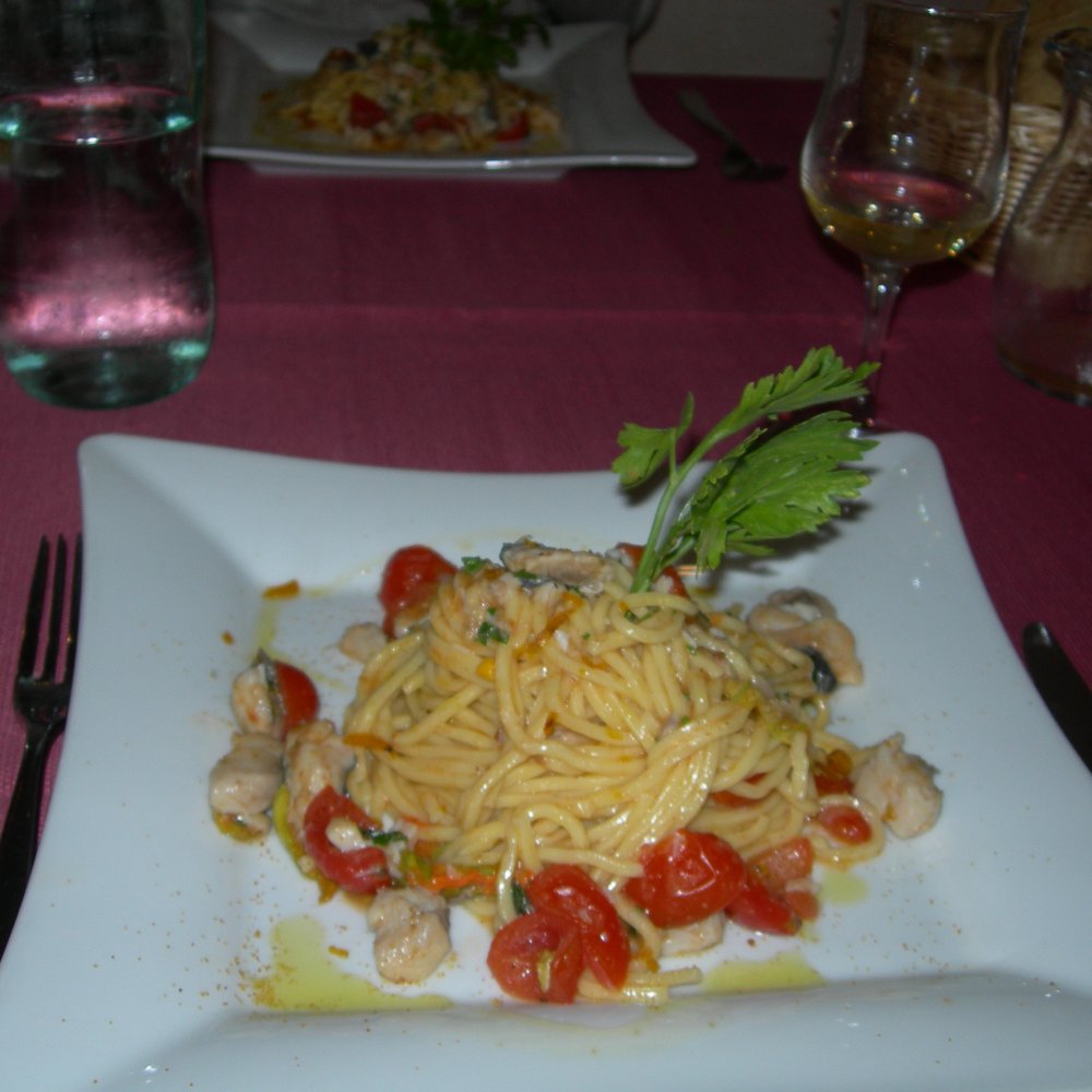 Il Corallo - July 10 2014; Spaghetti alla chitarra con filetti di occhiata (sea bream), fiori di zucca (zucchini blossoms), e bottarga. - Pizza Near Me - Alghero, SS