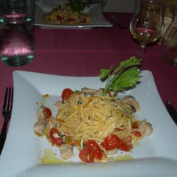 Il Corallo - July 10 2014; Spaghetti alla chitarra con filetti di occhiata (sea bream), fiori di zucca (zucchini blossoms), e bottarga.