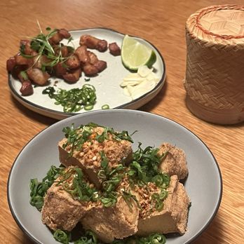 Phuket Cafe - Kua Tofu - $10 - so crispy!  Muu Kua Grua - $10 - eat with all of the garnishes! - Thai Near Me - Portland, Oregon
