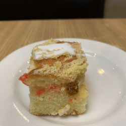 Omega Restaurant & Bakery - Greetings! Have some cake! Brought to the table before I ordered.
