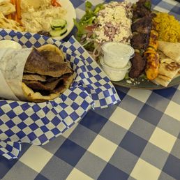 Gyros pita, kebab plate, and hummus plate Gyros pita, kebab plate, and hummus plate