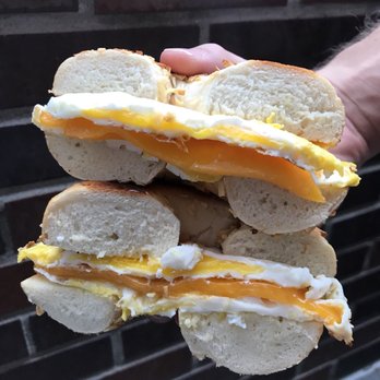 Davis Square Hand Crafted Donuts & Bagels - Egg and Cheese on an onion bagel - Donuts Near Me - Somerville, Massachusetts Davis Square Hand Crafted Donuts & Bagels - Egg and Cheese on an onion bagel - Donuts Near Me - Somerville, Massachusetts
