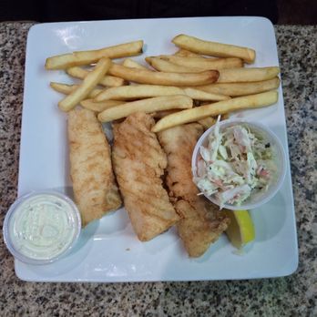 Hydeout Bar & Grill - Battered fish with a side of French fries for my hubby.. . - Sports Bars Near Me - Poplar Grove, Illinois