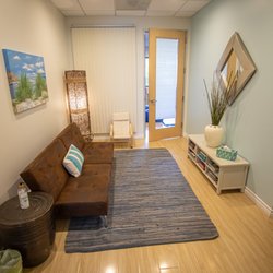 Kinder Clinic - Kinder Clinic's waiting room offers a calming space to relax while your child has a blast in their session!