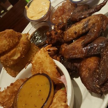Bahama Breeze - Appetizer: coconut shrimp, jerk wings, fritters, onion rings - Seafood Near Me - Raleigh, North Carolina Bahama Breeze - Appetizer: coconut shrimp, jerk wings, fritters, onion rings - Seafood Near Me - Raleigh, North Carolina