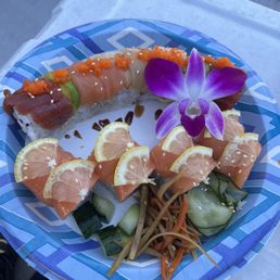 Rainbow Roll and a yummy salmon situation with lemon and California roll base! Rainbow Roll and a yummy salmon situation with lemon and California roll base!